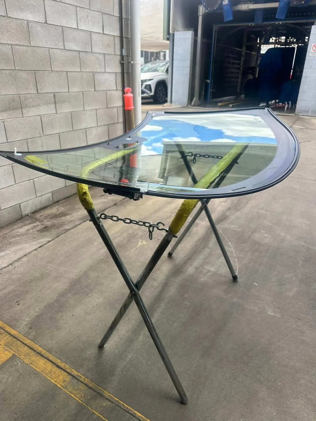 New windscreen on the glass stand before fitting